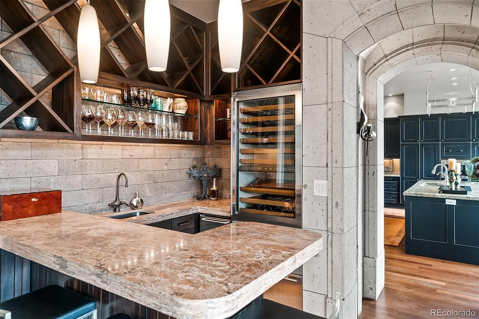 Wet bar with wine storage and glass-front wine fridge